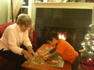 Grandma helps Will with his puzzle